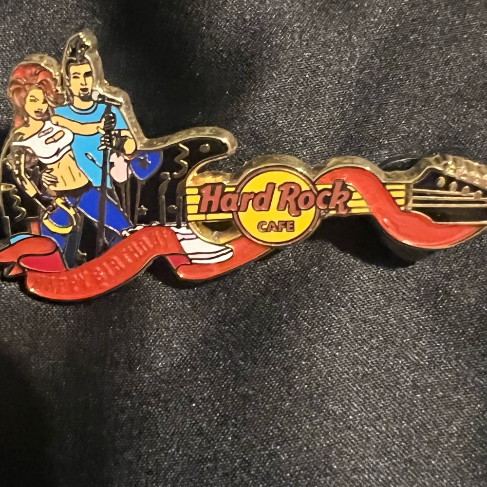 Hard Rock Cafe Pin with Red Ribbon and Yellow Logo Singapore